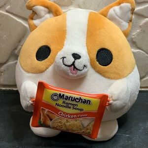 ZURU SNACKLES | Benji the Corgi with mini Maruchan Ramen
Noodle Soup packet.